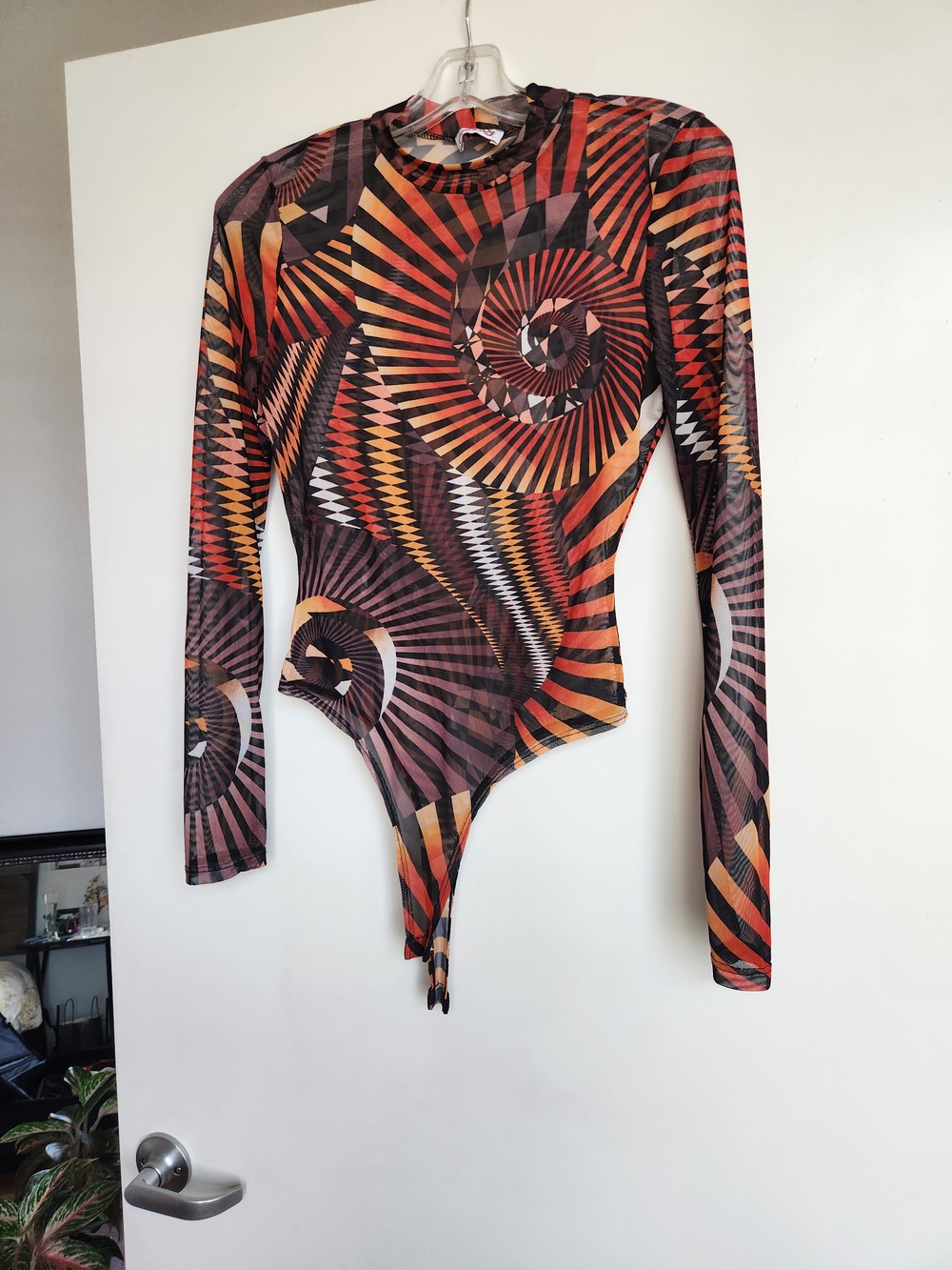 Abstract Spiral Print Long-Sleeve Bodysuit in Orange and Brown